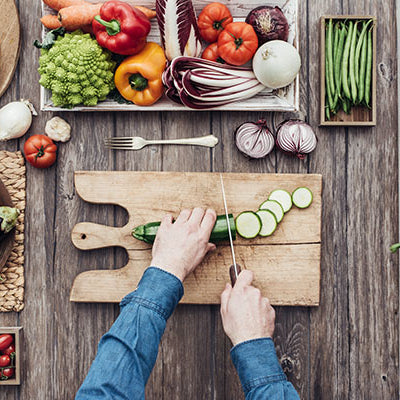 Image of Chef cutting cucumbers