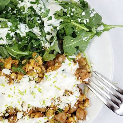 Image of Roasted Hatch Pepper Salad with Corn, Chickpeas and Lime Crema