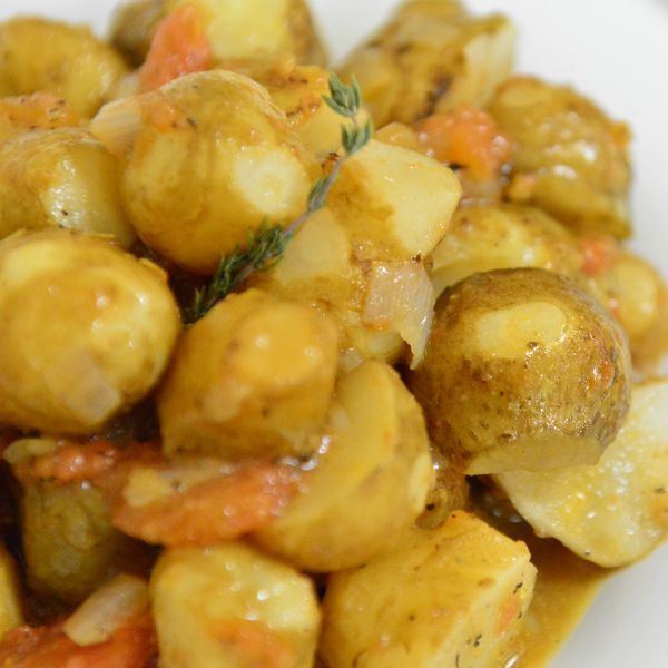 Image of Baked Sunchokes with Tomatoes Lemon and Sage