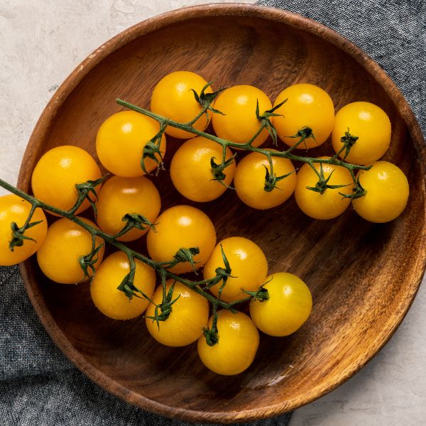 Image of Yellow Cherry Tomatoes on the Vine Fruit Styled